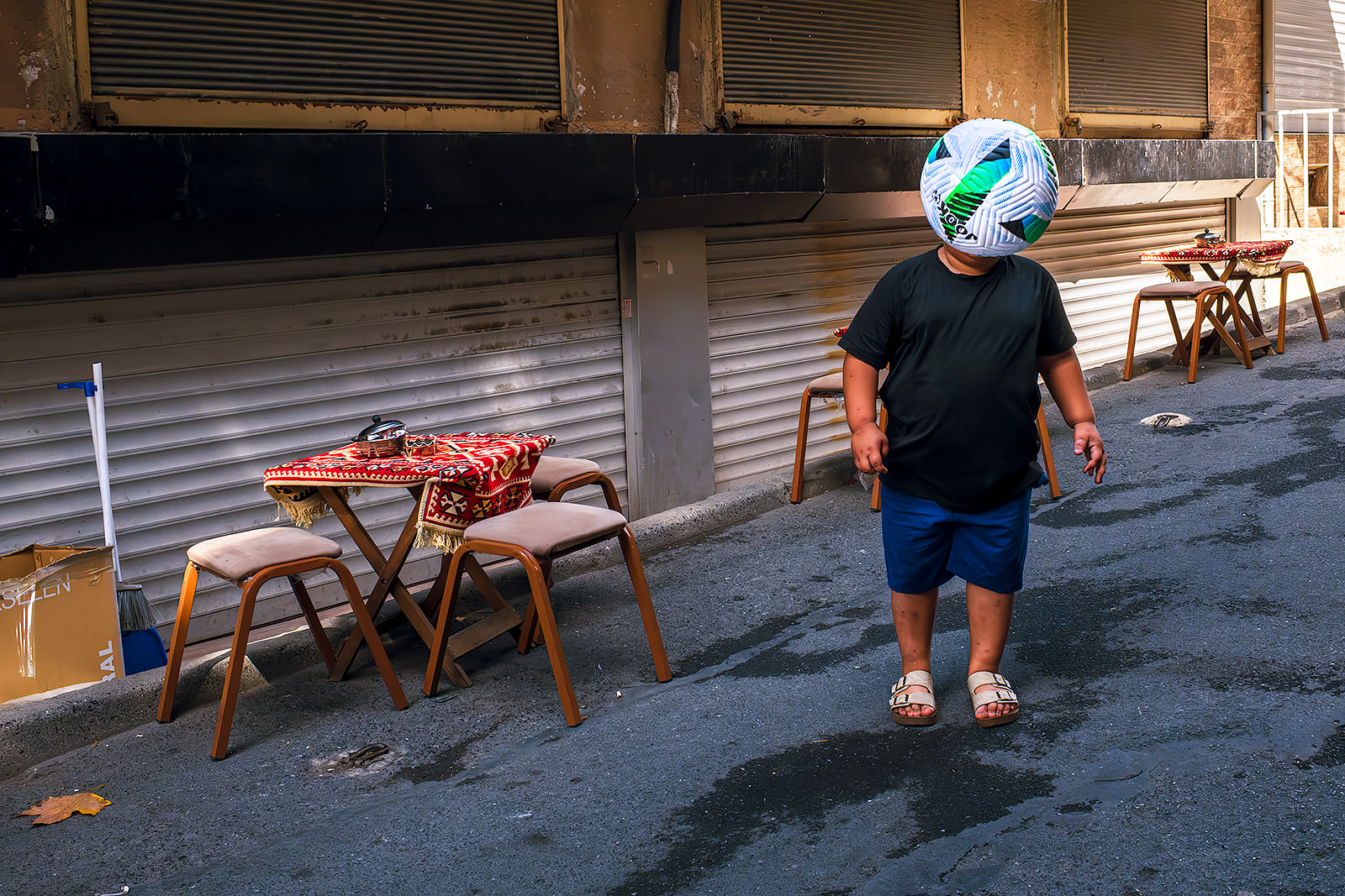Young lad playing football. Captured with the Fuji X100VI